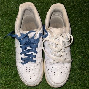 White Nike Air Force Sneakers with Blue Laces
